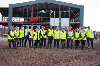 Members of the 100 Club on a site visit