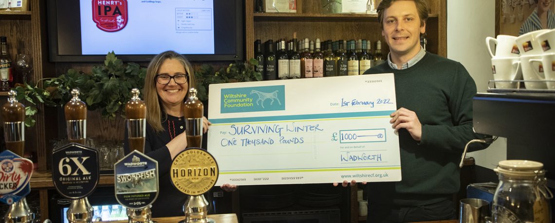 Wiltshire Community Foundation joint chief executive Vicky Hickey receiving a cheque from Wadworth chairman Toby Bartholomew