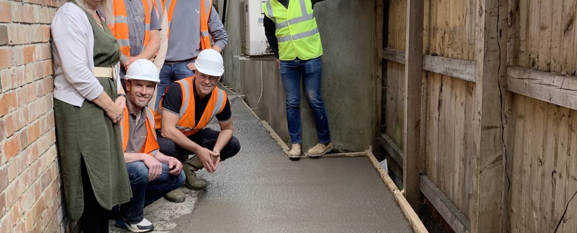 Doorway director Jo Kitching, left, with senior Stonewood management in the transformed outside area at The Citadel after their labours