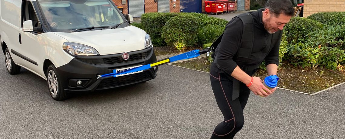 Branding expert Mike Land, who cheated death when his bungee snapped during a jump, is aiming to beat a world record by pulling a van.