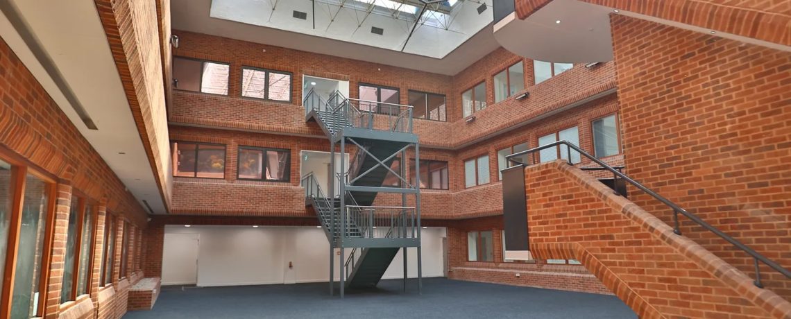 The former Newbury offices of pharmaceutical giant Bayer - which are partway to being converted into 191 apartments - have come to the market with property agent Sanderson Weatherall