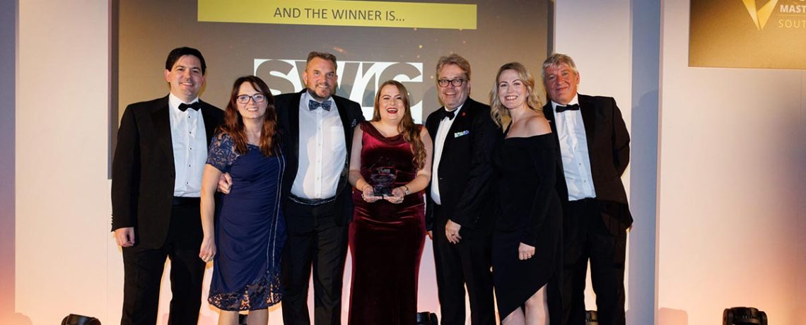 The SWIG Finance team showing off their South West Business Masters Investment Award 2023