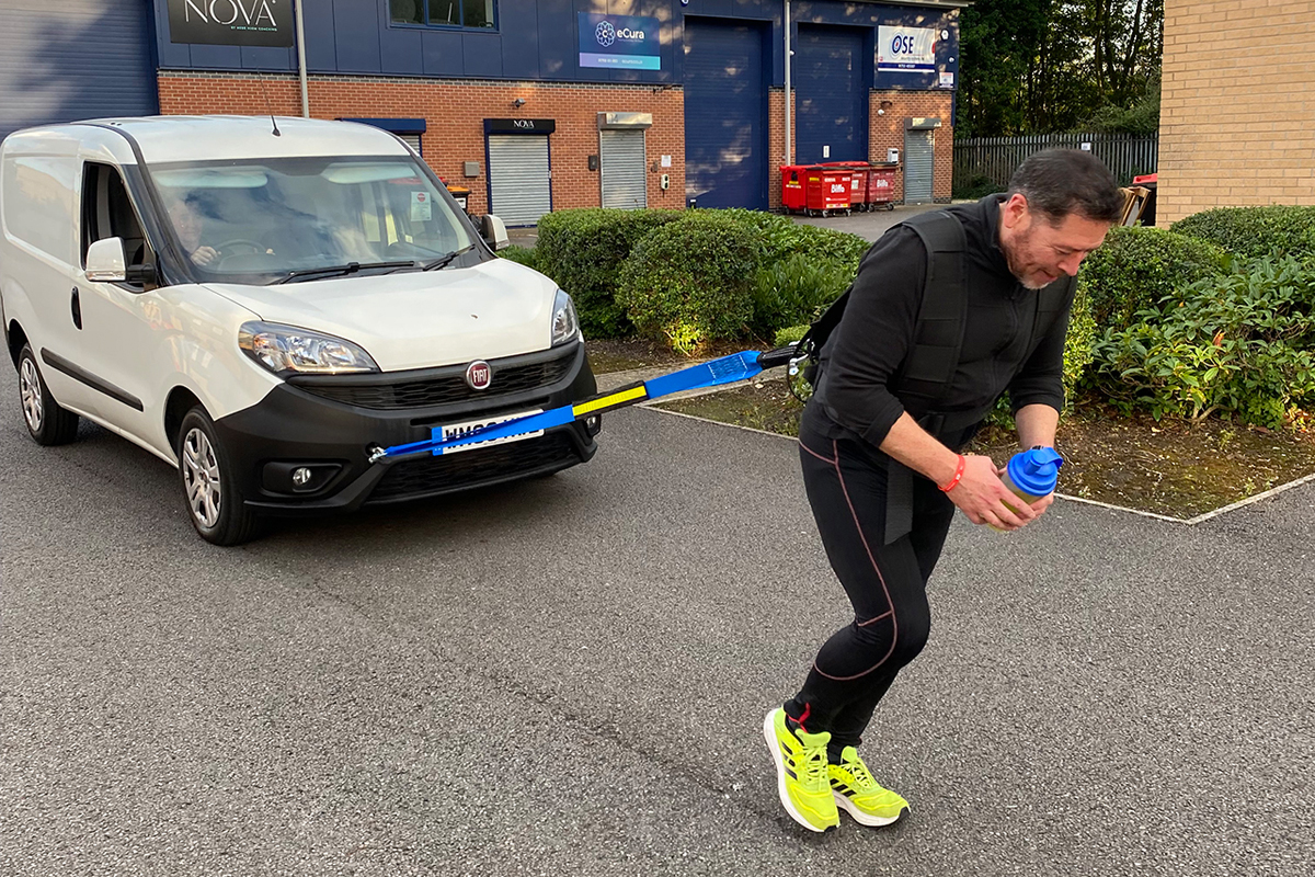 Branding expert Mike Land, who cheated death when his bungee snapped during a jump, has set the date for his Guinness World Record van pull attempt.