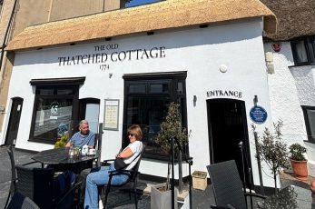 The oldest building in Weston-super-Mare, and the last one in the seaside town with a thatched roof, is sporting a new do.