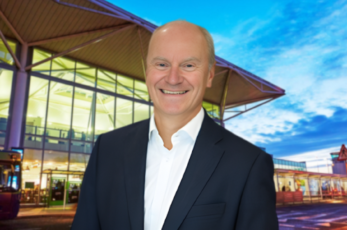 The chief executive of Bristol Airport has announced that he will step down after eight years in the role.