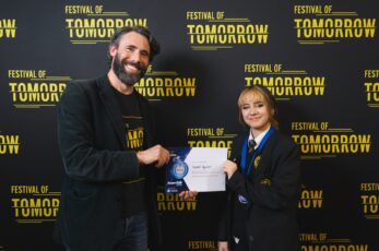 A Swindon teenager has won a science competition with a talk on the neuroscience of déjà vu.