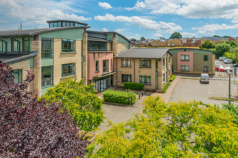 Plans by a social housing provider to turn its former Wiltshire office into 30 flats have been revealed.